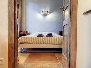 Postel nebo postele na pokoji v ubytování Résidence Verdi - Appartements meublés en centre ville