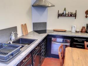 Kuchyň nebo kuchyňský kout v ubytování Résidence Verdi - Appartements meublés en centre ville