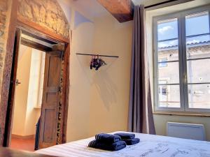 Postel nebo postele na pokoji v ubytování Résidence Verdi - Appartements meublés en centre ville