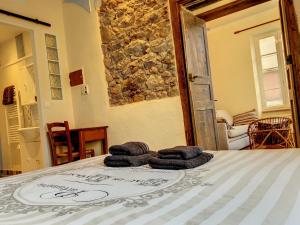 Postel nebo postele na pokoji v ubytování Résidence Verdi - Appartements meublés en centre ville