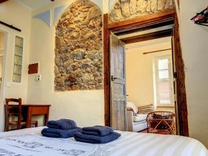 Postel nebo postele na pokoji v ubytování Résidence Verdi - Appartements meublés en centre ville