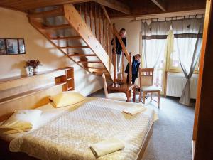 Postel nebo postele na pokoji v ubytování Hotel PAM