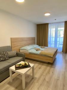 Postel nebo postele na pokoji v ubytování Apartmán Flower