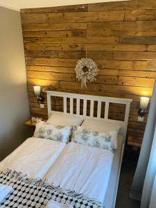 Łóżko lub łóżka w pokoju w obiekcie Apartamenty sudeckie nad zalewem III