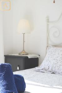 Łóżko lub łóżka w pokoju w obiekcie Casa Maresía Las Moreras con Vista Mar en primera linea y Piscina compartida