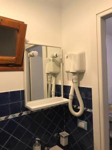 Koupelna v ubytování Double room "Dora" - La Scogliera