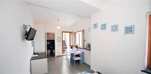 Kuchyň nebo kuchyňský kout v ubytování Double room "Dora" - La Scogliera