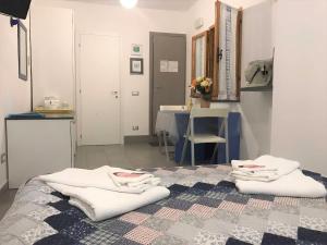 Postel nebo postele na pokoji v ubytování Double room "Dora" - La Scogliera