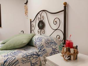 A bed or beds in a room at Terrazza del Golfo