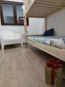 A bed or beds in a room at Terrazza del Golfo