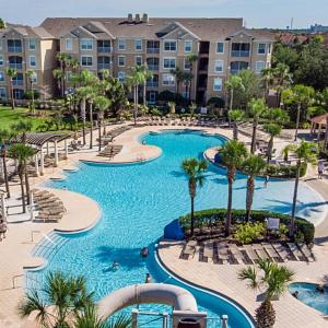 A view of the pool at Condominium Apartment Close to Disney in Orlando Florida or nearby