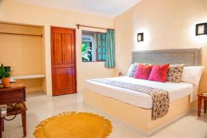 Postel nebo postele na pokoji v ubytování Hacienda San Miguel Yucatan