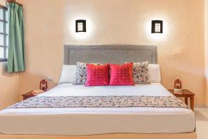 Postel nebo postele na pokoji v ubytování Hacienda San Miguel Yucatan