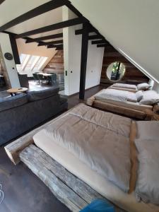 Posteľ alebo postele v izbe v ubytovaní Dom Minimal House