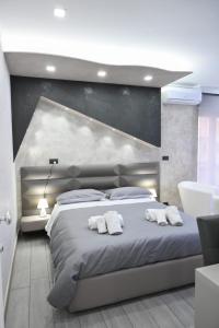 A bed or beds in a room at B&B The Dream