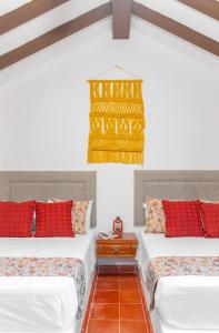 Postel nebo postele na pokoji v ubytování Hacienda San Miguel Yucatan