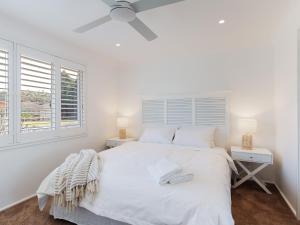 En eller flere senge i et værelse på 81 Horace St - Wifi, Pool and air conditioning + 19 billeder