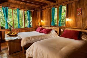 Postel nebo postele na pokoji v ubytování Casa Divina Eco Lodge + 37 fotografií