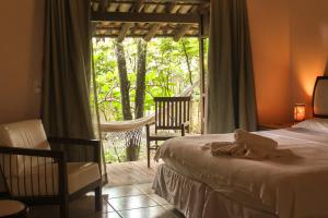 Cama ou camas em um quarto em Pousada Villa Bella