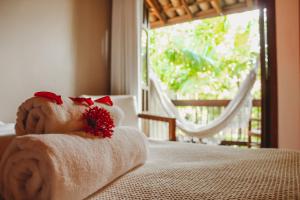 Cama ou camas em um quarto em Pousada Villa Bella