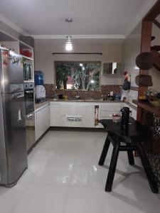 Η κουζίνα ή μικρή κουζίνα στο Casa dos sonhos - Alto Padrão