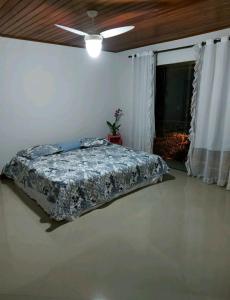 Ένα ή περισσότερα κρεβάτια σε δωμάτιο στο Casa dos sonhos - Alto Padrão