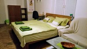 Posteľ alebo postele v izbe v ubytovaní Mier city center 2.