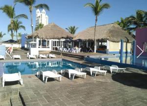 Bazén v ubytování Casa en la playa nebo v jeho okolí