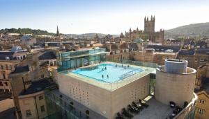 a building with a swimming pool on top of it at Little Elm - luxury home from home, free parking, 30-40 mins walk from Bath city centre in Bath