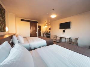 Postel nebo postele na pokoji v ubytování Hotel Sentro Legazpi + 13 fotografií