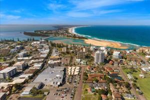 an aerial view of a city and the beach at Spacious 2BR near The Entrance Beach - 7Min Walk! in The Entrance