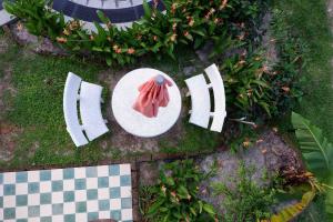 an overhead view of a table with a plate of food at Sunbird Garden Resort in Sihanoukville