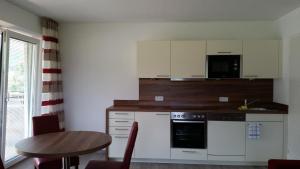 Kuchyňa alebo kuchynka v ubytovaní K3 - Appartements