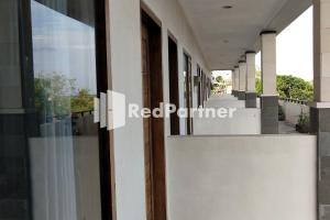 Gallery image of Pondok Sentana Guest House at Jalan Raya Uluwatu RedPartner in Ungasan