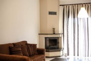 A seating area at Meteora's Secret Garden House#2