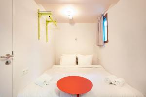 Postel nebo postele na pokoji v ubytování Hotel Not Hotel Rotterdam