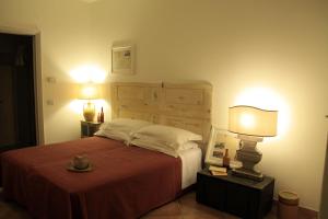 Postel nebo postele na pokoji v ubytování B&B Villa Giuliana + 37 fotografií