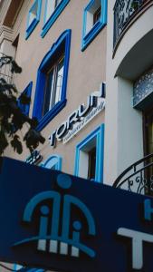 a sign on the side of a building at Hotel Torun Istanbul Old City in Istanbul