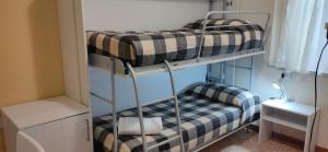 Postel nebo postele na pokoji v ubytování Hotel Ristorante Miramare