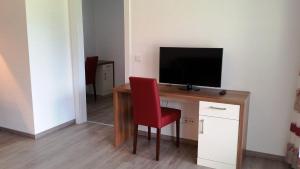 Televízia a/alebo spoločenská miestnosť v ubytovaní K3 - Appartements
