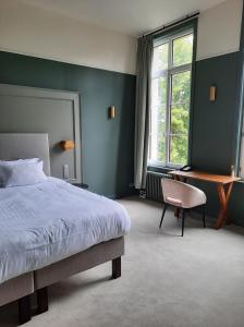 Кровать или кровати в номере Chateau D'aubry