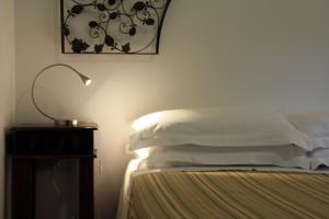 Postel nebo postele na pokoji v ubytování B&B Villa Giuliana