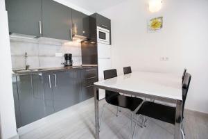 Kuchyň nebo kuchyňský kout v ubytování Vivienda Vacacional Erido