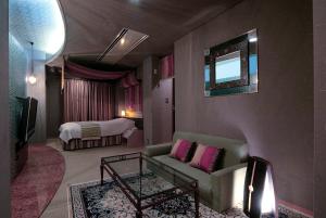 Giường trong phòng chung tại ホテル隠宿 凛 Rin +7 ảnh