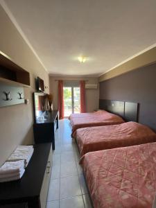 Postel nebo postele na pokoji v ubytování sozos inn hotel vonitsa + 21 fotografií