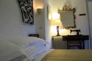 Postel nebo postele na pokoji v ubytování B&B Villa Giuliana