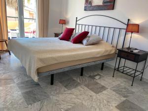 Posteľ alebo postele v izbe v ubytovaní Manilva Beach Casa de Pedro