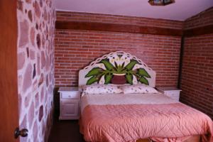 Ένα ή περισσότερα κρεβάτια σε δωμάτιο στο Villas La Bisnaga