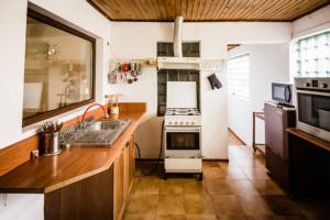 Кухня или кухненски бокс в Casa Adelina