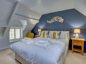 Voodi või voodid majutusasutuse Crab Cottage toas